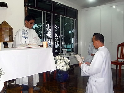 Arnold Garferio makes his Vows in front of Larry Sabud the Philippines District Superior