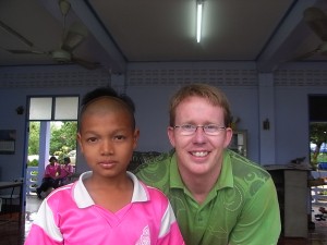 Frank with a student in the English Language Camp