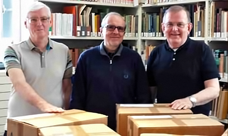 Frs Larry Duffy, Carlo-Maria Schianchi and Marist Fathers' Superior General, John Hannan, with boxes of documents to reopen the Cause of Marist Founder, Jean Claude Colin